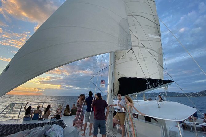 Sunset & Harbor Lights Dinner Sail from the Marriott's Frenchman's Cove - Drinks, music, and the crew energy that makes it feel like a party (without the chaos)